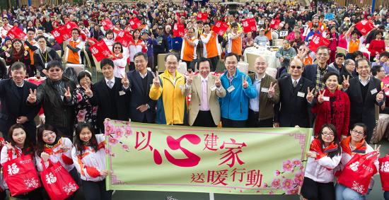 Thomas Kwok (front, centre) and guests celebrate Chinese New Year with elderly people