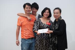 SHKP Club Managing Director Winnie Tse (right in both photos) congratulating winners