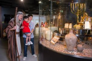 Moses returns through time with treasures from Israel