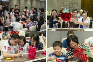 Participants making Loving Home sky lanterns and filling them with warm wishes