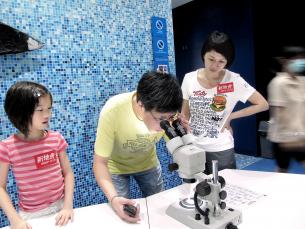 members examined organism with microscope to understand their importance to the ocean and mankind